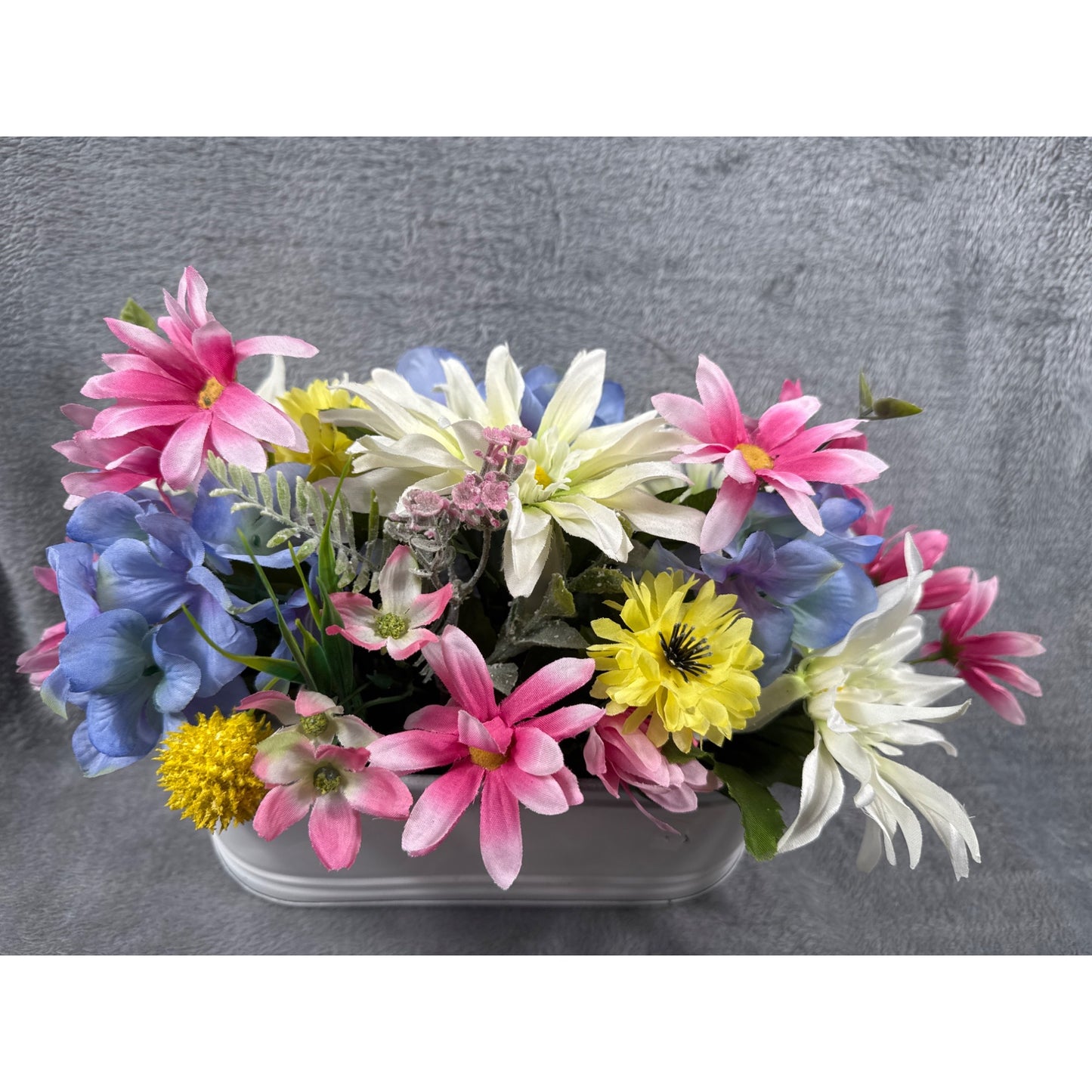Artificial Floral Arrangement In White Metal Planter With Pink Yellow Blue & White Flowers