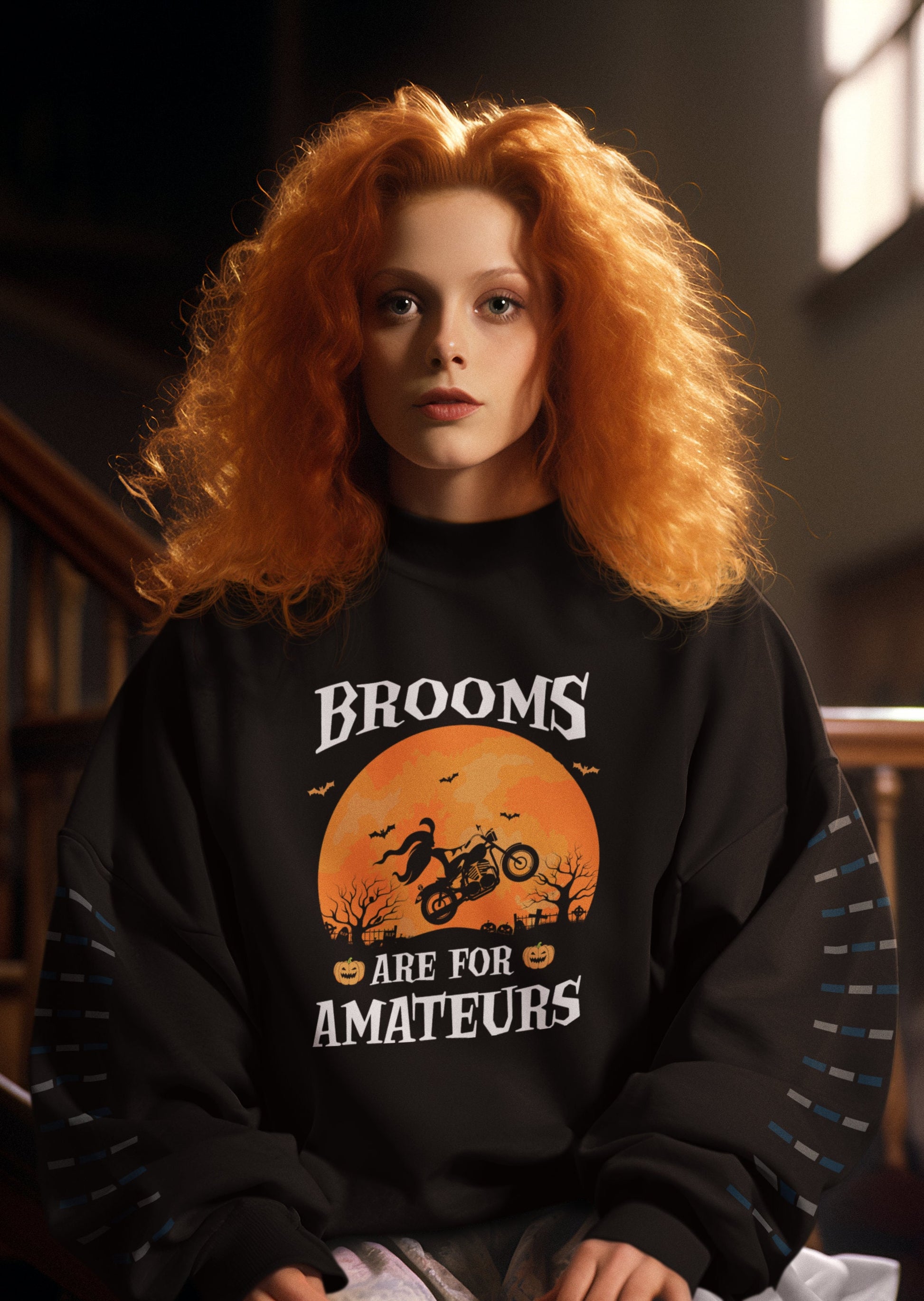 Get into the Halloween spirit with this "Brooms are for Amateurs" shirt featuring a witch riding a bike under a full moon!