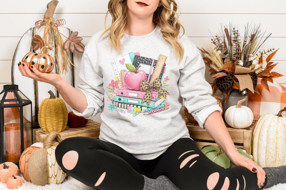 Custom School Supplies Sweatshirt, Teacher Gift, Leopard Print Bow, Vibrant Book Print, Back To School Apparel