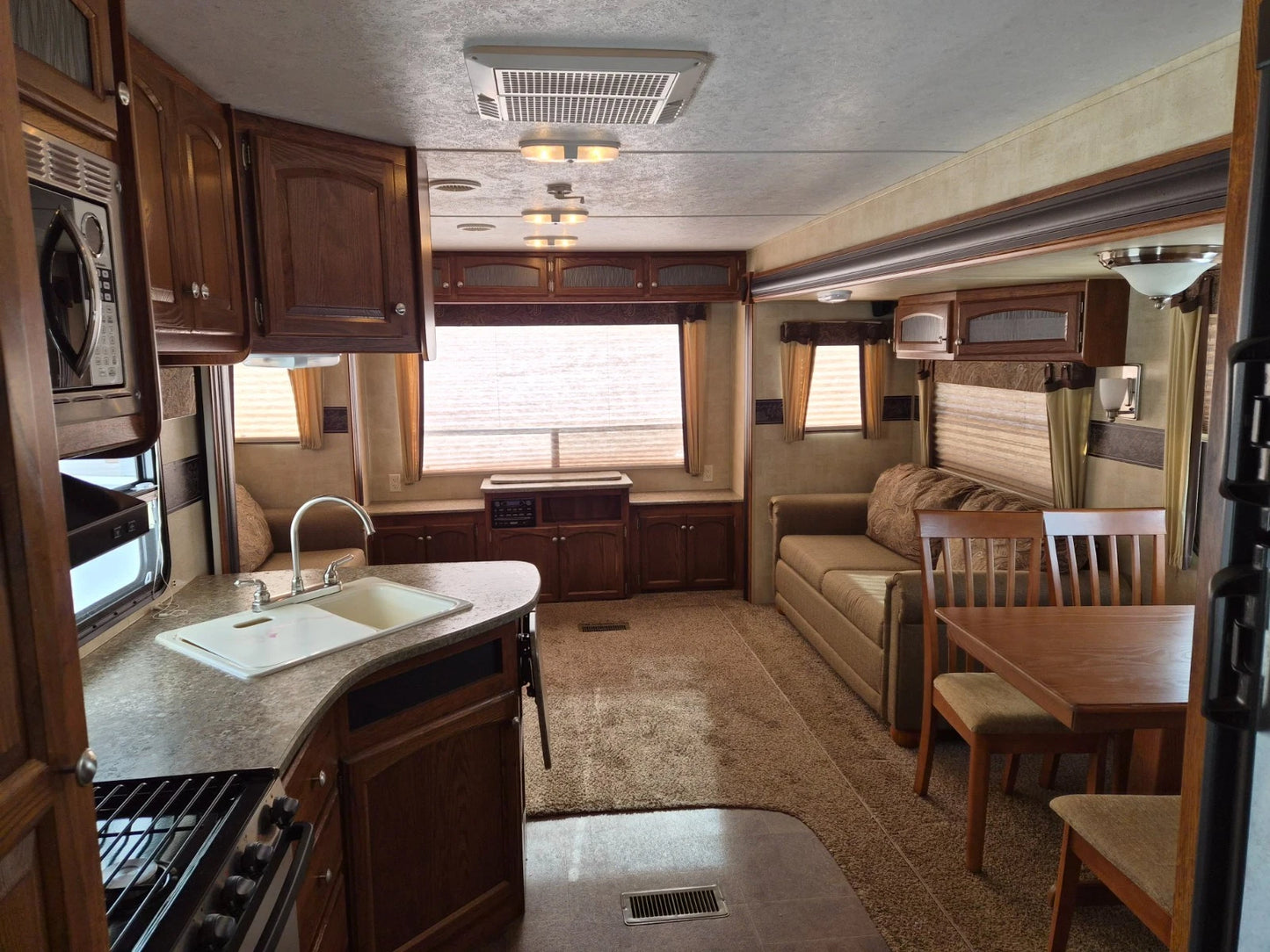 2012 KEYSTONE HORNET HIDEOUT PLATINUM CAMPER TRAILER 31RLDS