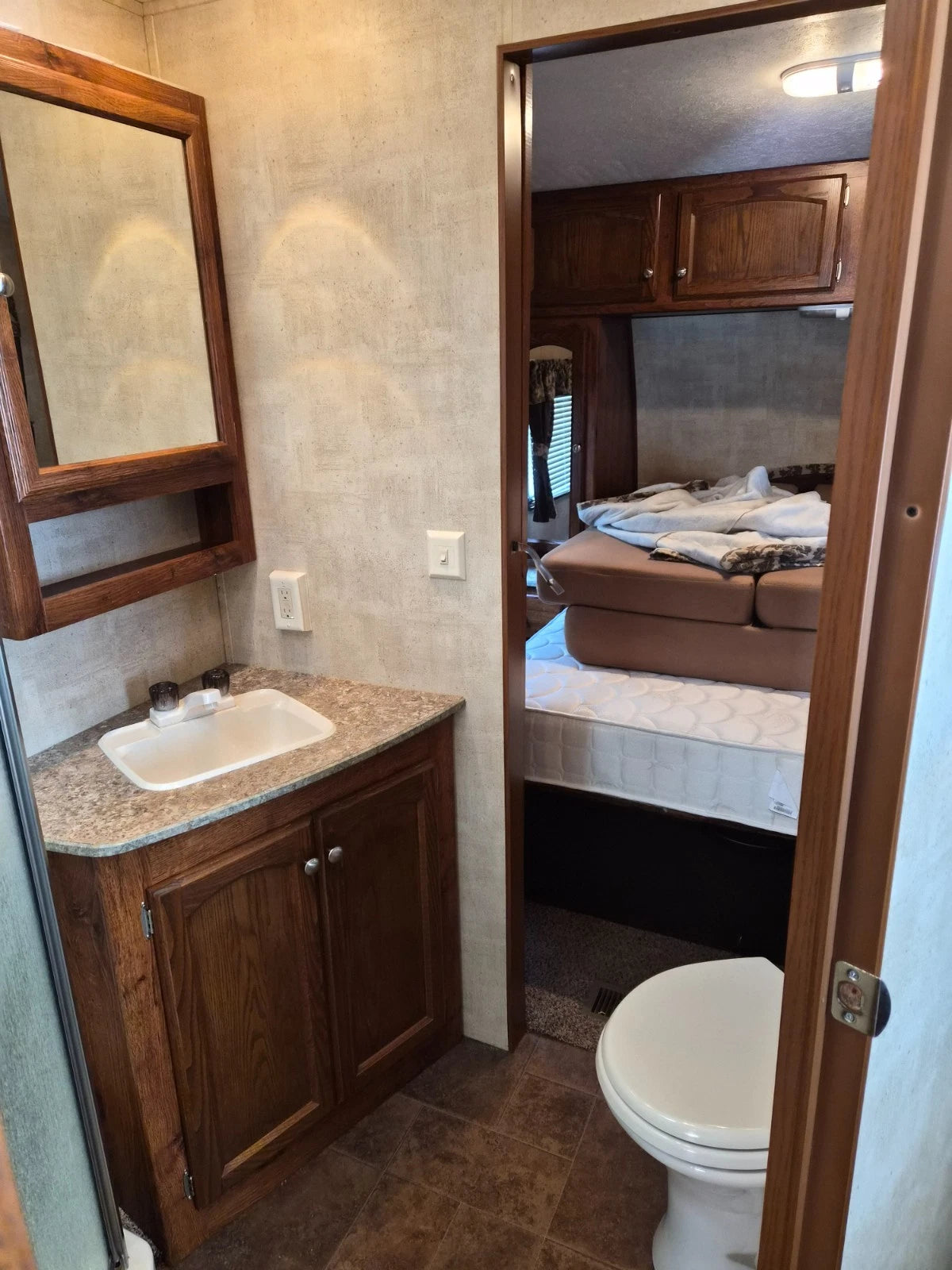 2012 KEYSTONE HORNET HIDEOUT PLATINUM CAMPER TRAILER 31RLDS